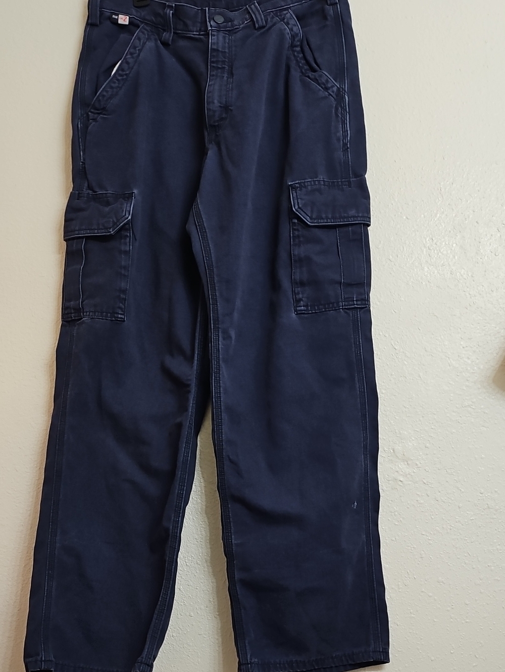 Carhartt Men's Flame-Resistant Canvas Cargo Pants in Dark Navy, size 32 x 30.